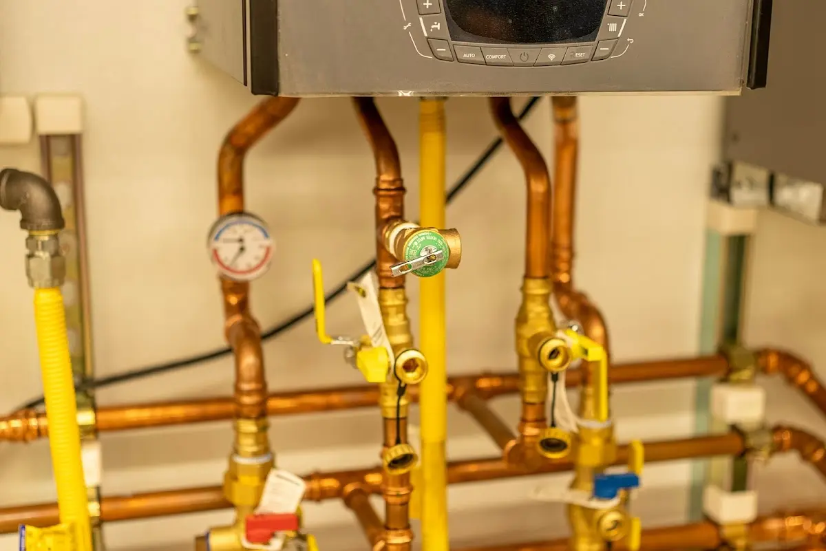 Licensed technician providing Water Heater Installation for a homeowner in Bryan